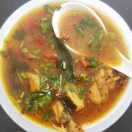 A bowl of delicious soup with boiled chicken, spices,and some vegetables is good for health.