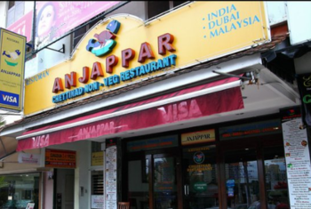A restaurant with vibrant decor and Indian cuisine attracts customers across multiple cities.