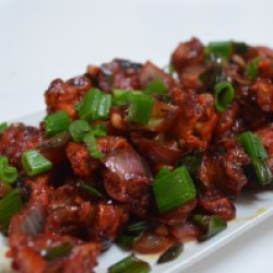 The healthy and delicious vegetarian meals, including wings topped with green onions and mushrooms.