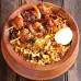  A plate of food showcasing a variety of biriyani and egg, a satisfying weekend special dish
